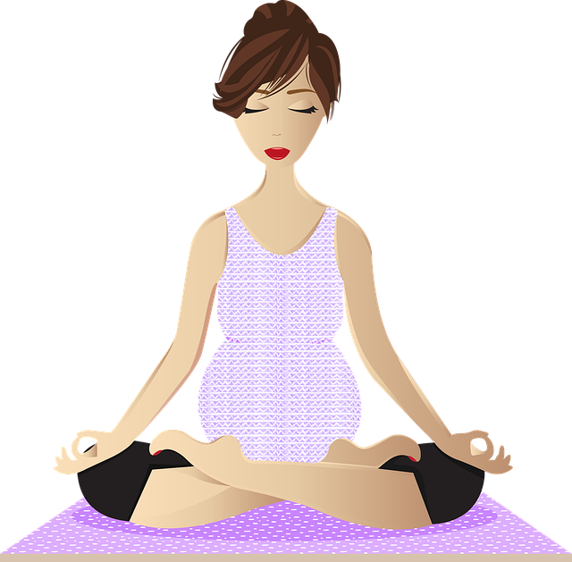 pregnant woman doing yoga mindfulness